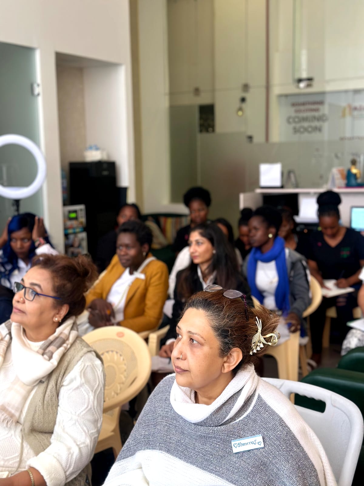 A photo showcasing a group of Masterclass students paying attention during a class session with Luakik Shah.