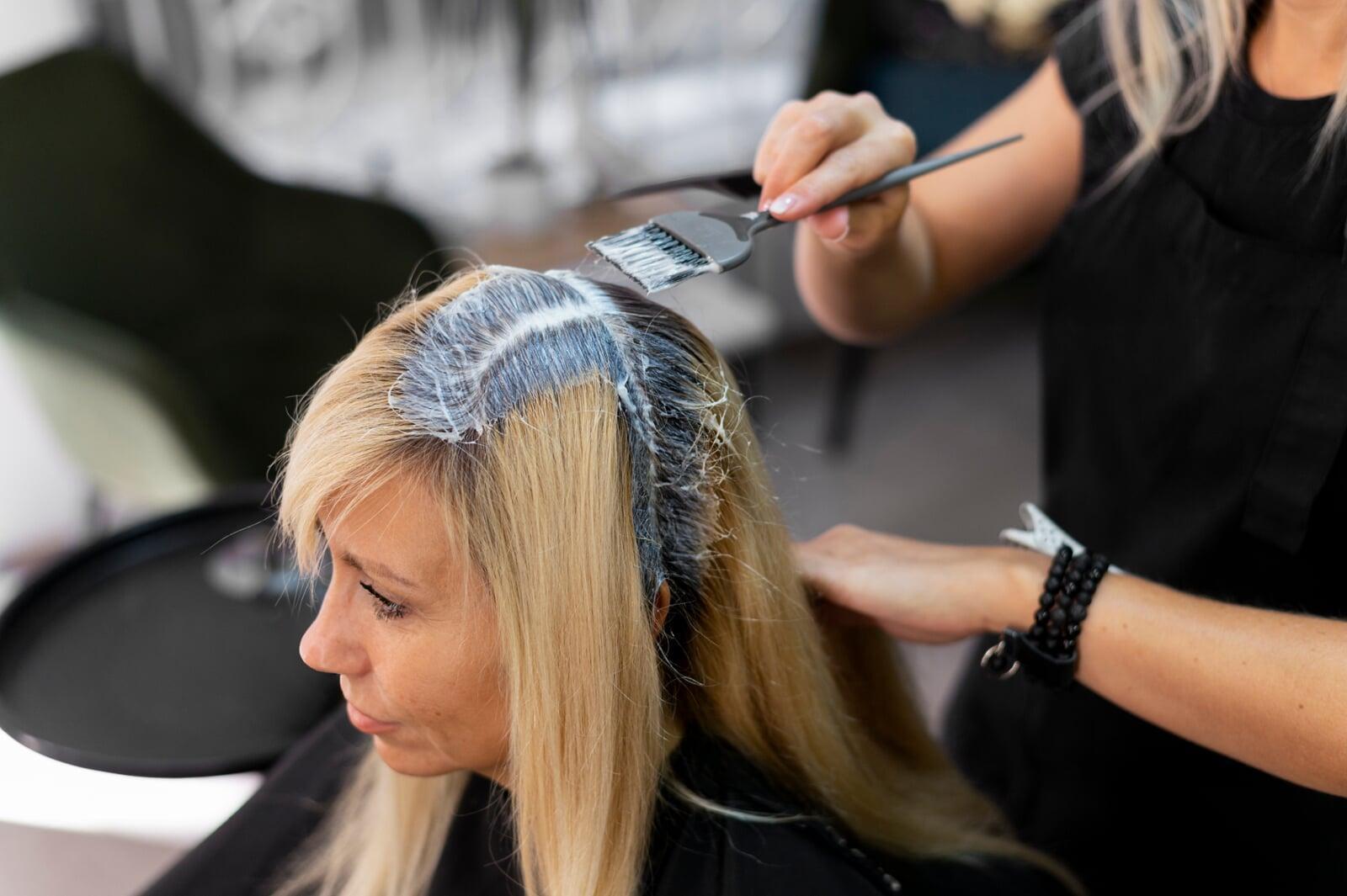 A photo hair colouring process going on.