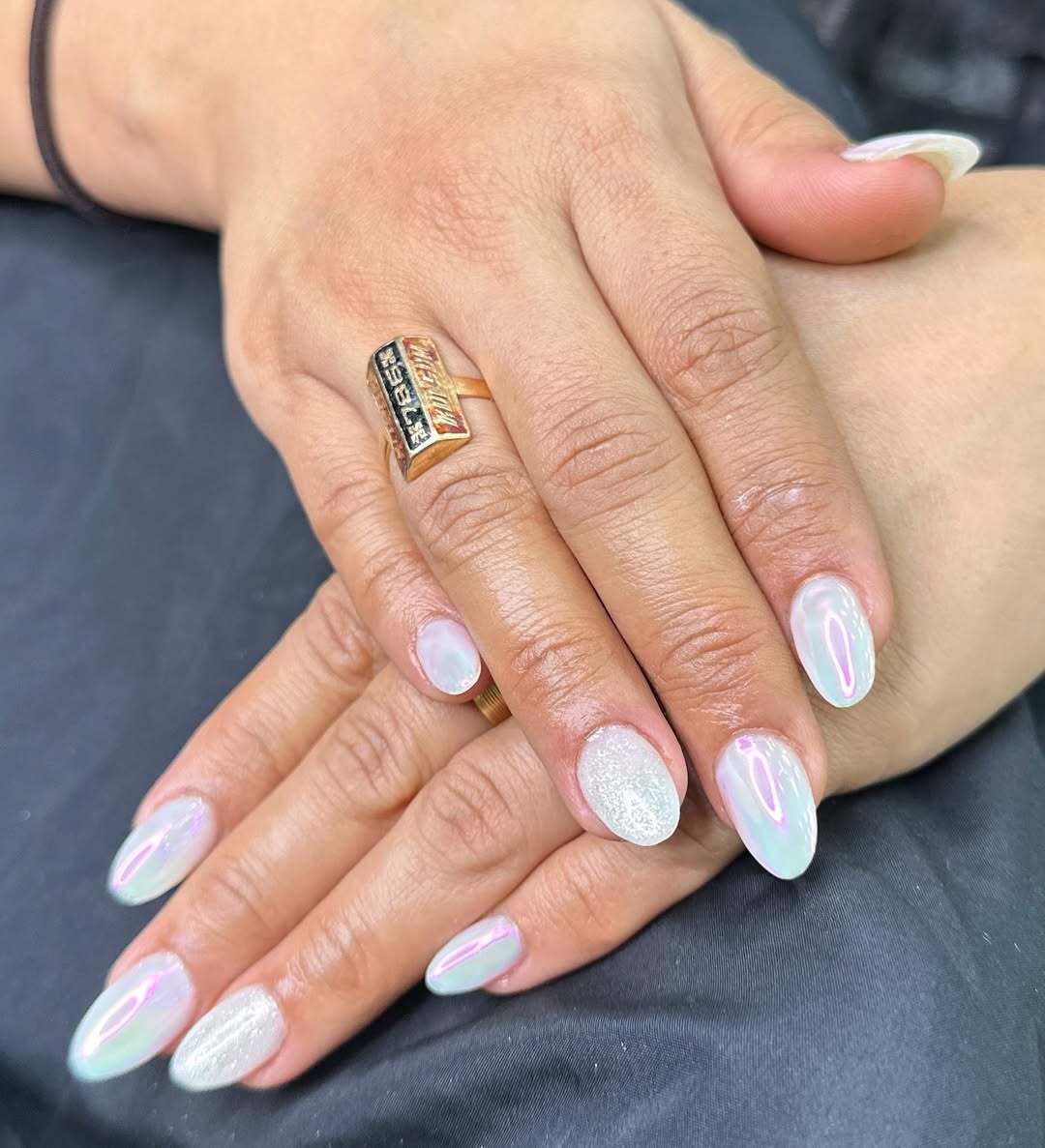 A photo showing beautifully done nails by Mitchell, a manicurist and pedicurist.